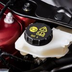 How to check the brake fluid level?