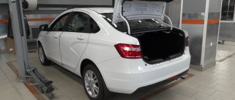 Lada Vesta with open trunk