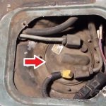 The arrow indicates the location of the fuel pump